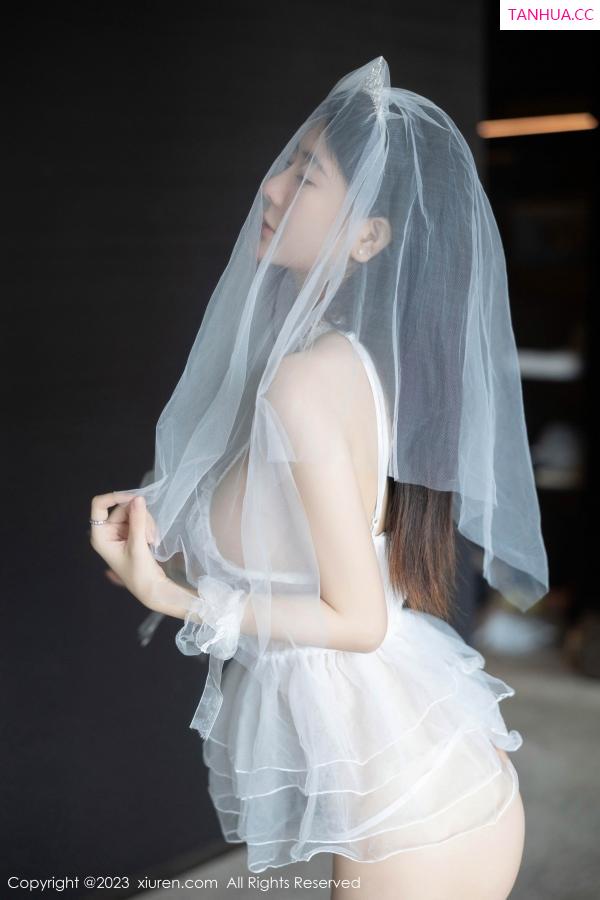   [XiuRen]高清写真图 2023.07.31 No.7165 幼幼 婚纱丝袜第5张图片